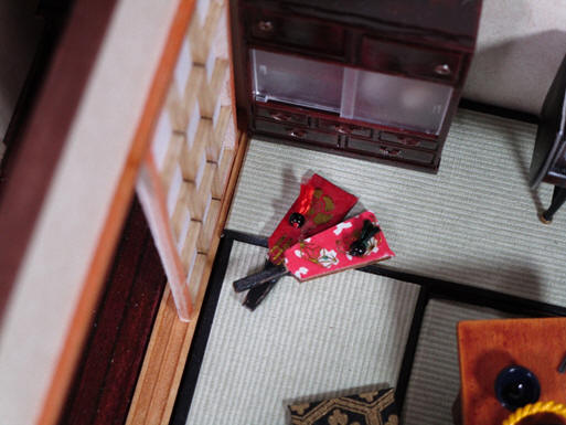 Cabinet and battledore