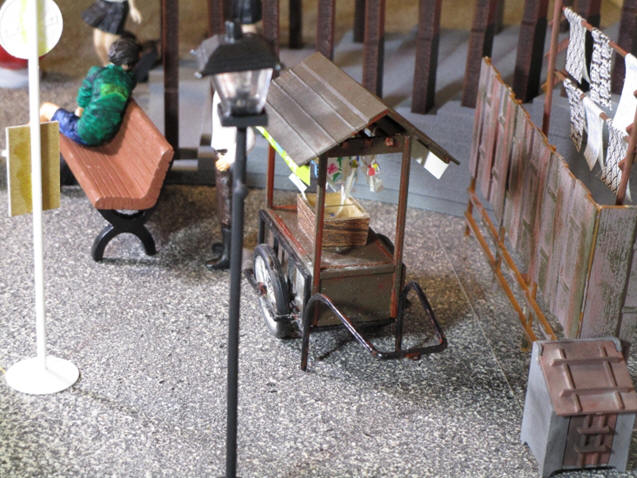 Towels on a wash line, waste basket 