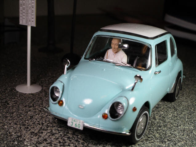 Grand fater is driving with a grand daughter